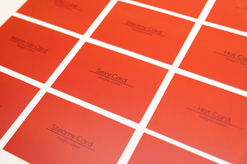 card backs of the naughty game by joyful couple