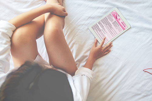 woman reading sexy scripts from joyful couple