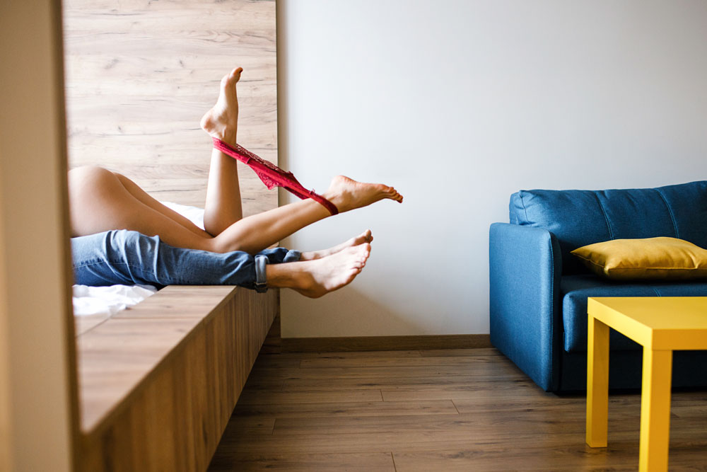 couple having fun, sensual connection, bedroom