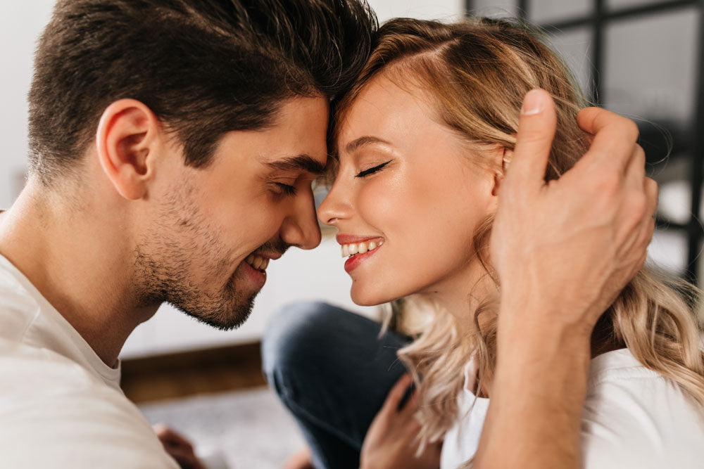 Man and woman being physically affectionate