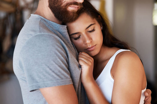 couple huging an toushing in a couplassionate way